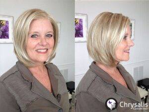 Woman wearing hand tied blonde synthetic wig